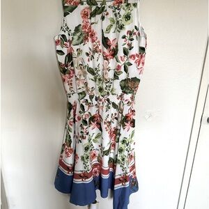 Tommy Hilfiger new with tags summer dress. It is sleeveless with a V-neck.